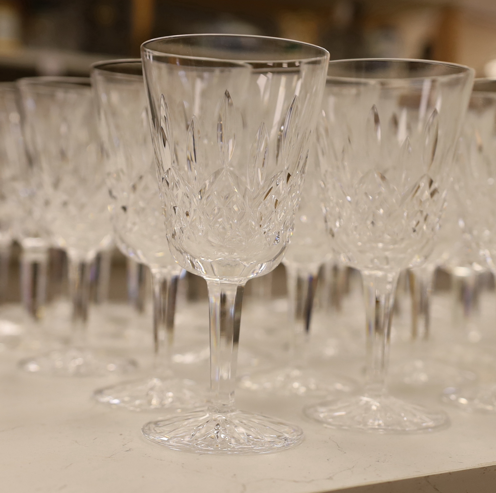 A 68 piece part suite of Waterford cut crystal ‘’Lismore’’ pattern drinking glassware, consisting:- 12 champagne glasses, 9 red wine glasses, 6 white wine glasses, 12 liqueur glasses, 12 whisky tumblers, 12 sherry glasse